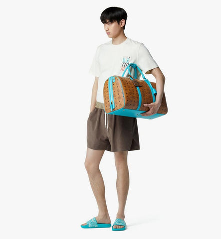 MMVGATT08CO001-MCM x We The Best Ottomar Weekender Bag in Visetos|Cognac
