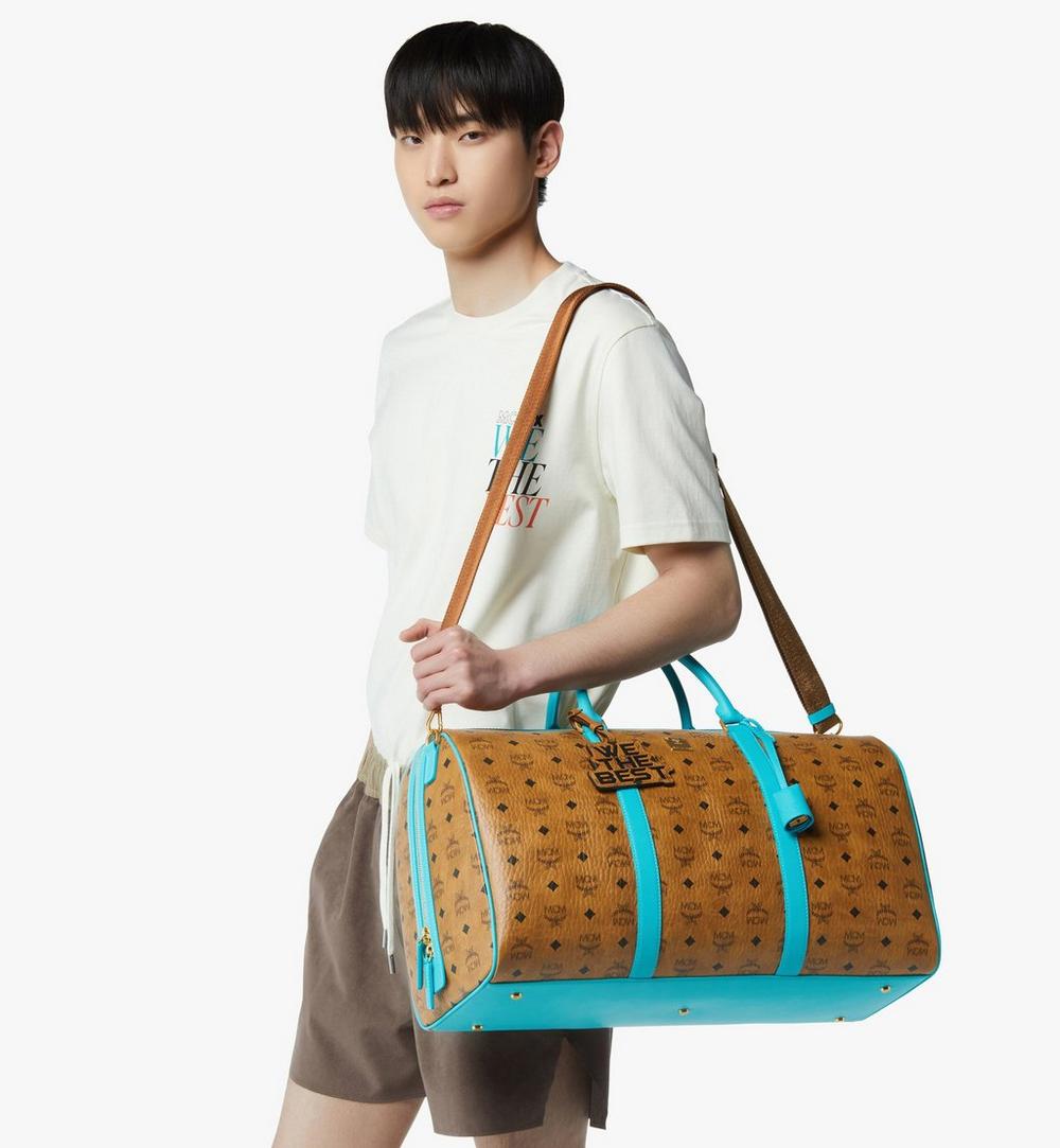 MMVGATT08CO001-MCM x We The Best Ottomar Weekender Bag in Visetos|Cognac